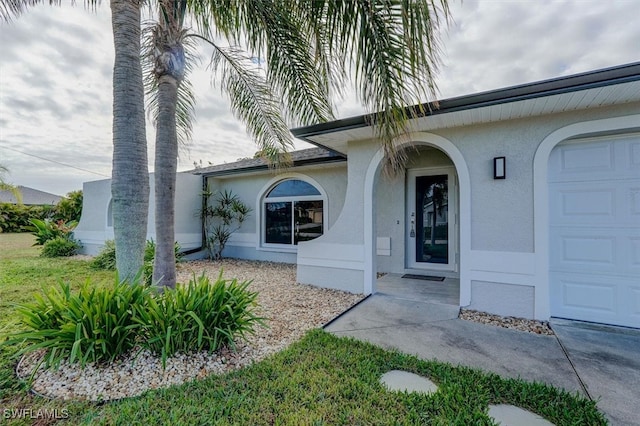 property entrance featuring a garage