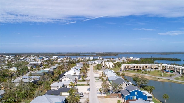 21671/21673 Indian Bayou Dr, Fort Myers Beach, FL 33931 - aerial perspective of suburban area with a nearby body of water