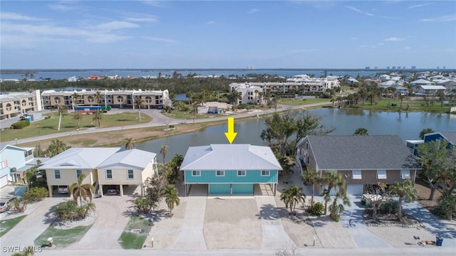 21671/21673 Indian Bayou Dr, Fort Myers Beach, FL 33931 - aerial perspective of suburban area featuring a nearby body of water