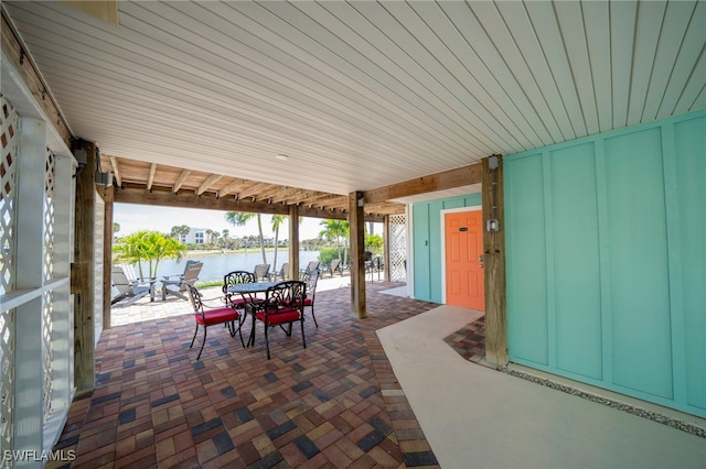 view of patio / terrace with a water view