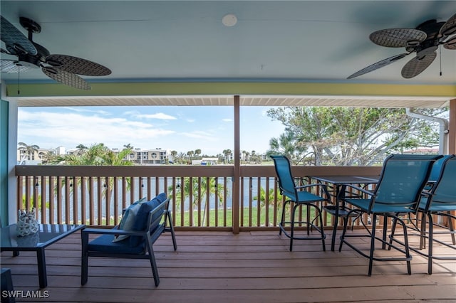 wooden terrace with ceiling fan