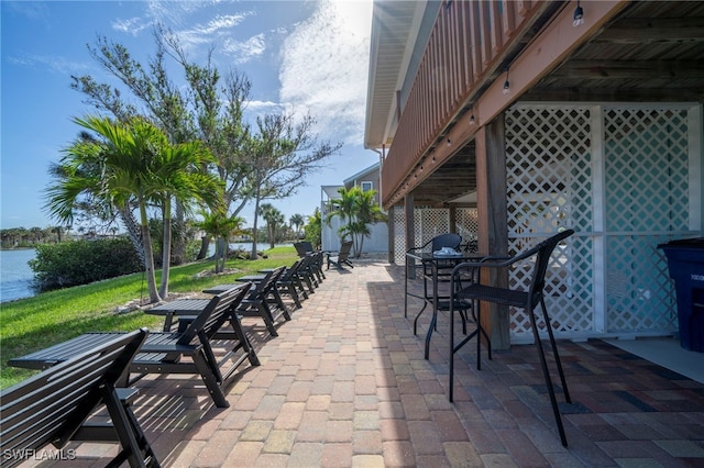 view of patio / terrace with a water view