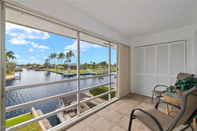 sunroom with a water view