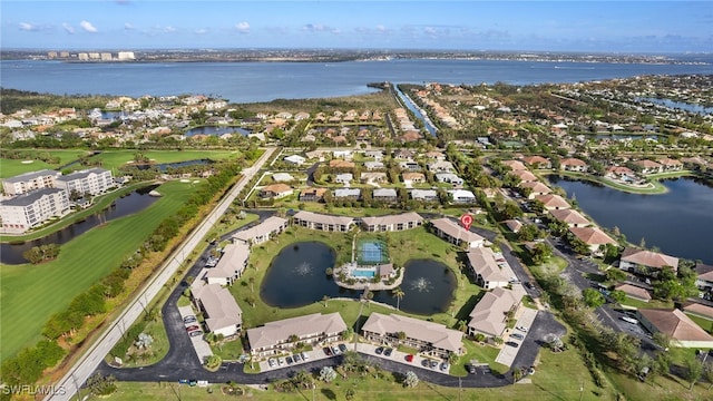 bird's eye view with a water view