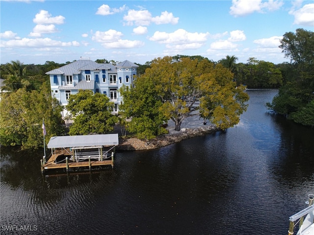 exterior space with a water view