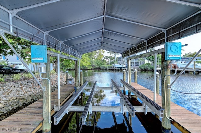 view of dock featuring a water view