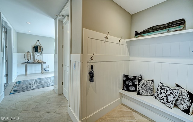 mudroom with light tile patterned floors