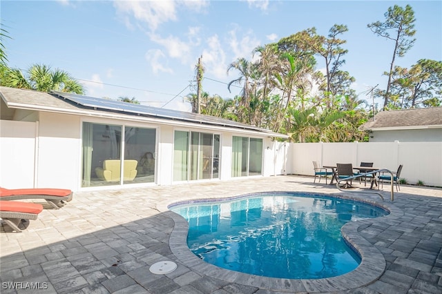 view of pool with a patio