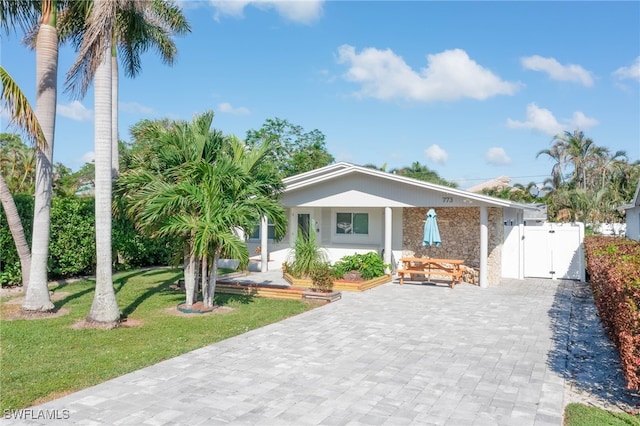 view of front of property with a front lawn