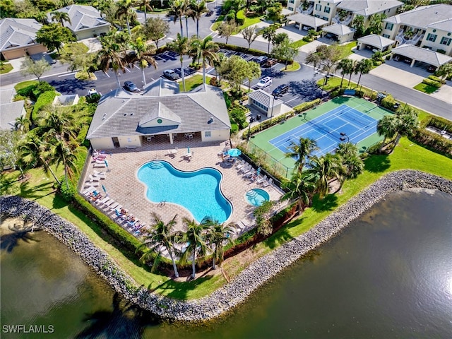 birds eye view of property featuring a water view