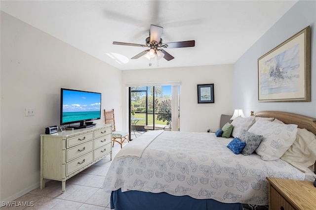 bedroom with ceiling fan, light tile patterned floors, and access to outside