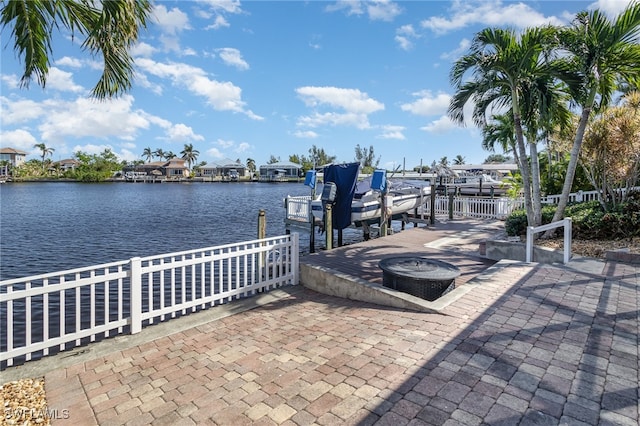 dock area with a water view