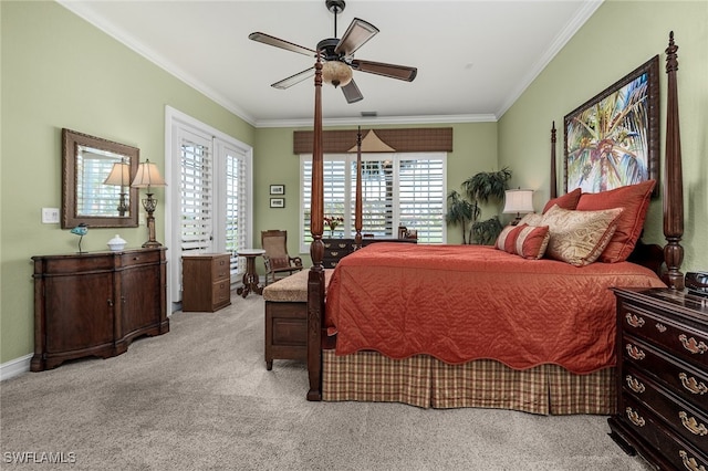 bedroom with baseboards, carpet flooring, a ceiling fan, and crown molding