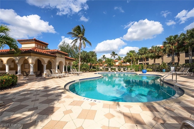 community pool featuring a patio