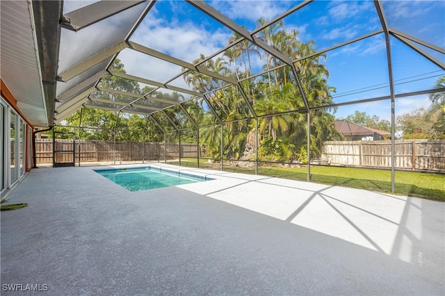 view of pool featuring a patio and a lanai