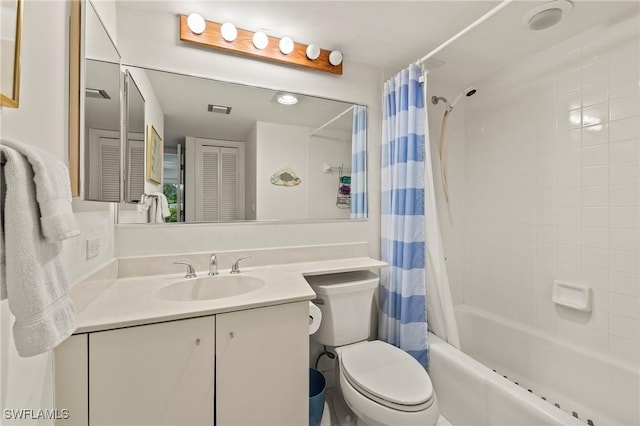 full bathroom with toilet, vanity, and shower / bath combination with curtain