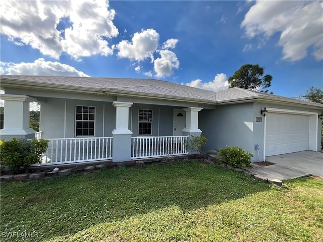 2917 43rd St W, Lehigh Acres, FL 33971 - single story home with covered porch, stucco siding, a garage, driveway, and a front yard
