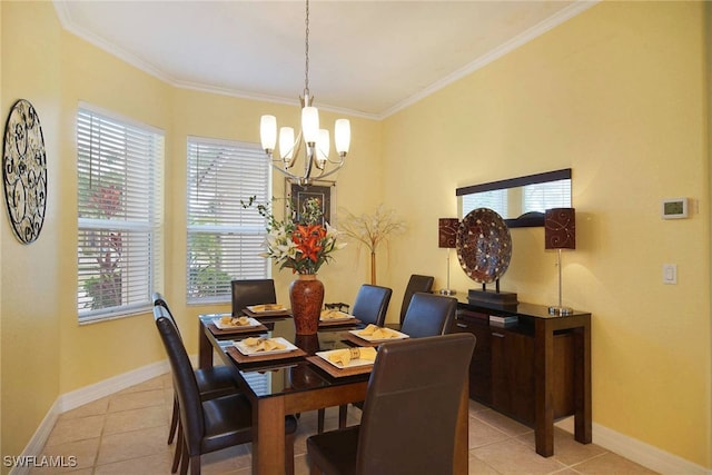 dining space with crown molding, light tile patterned floors, and a chandelier