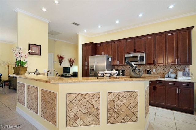 kitchen featuring light stone countertops, light tile patterned floors, ornamental molding, and appliances with stainless steel finishes