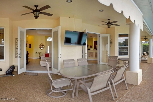 exterior space featuring french doors and ceiling fan