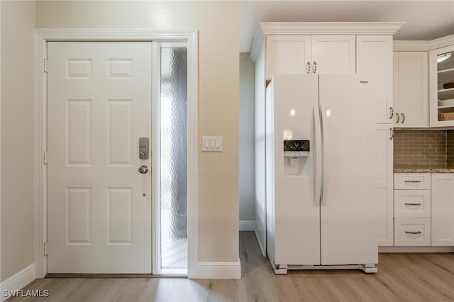 entryway with light wood-type flooring