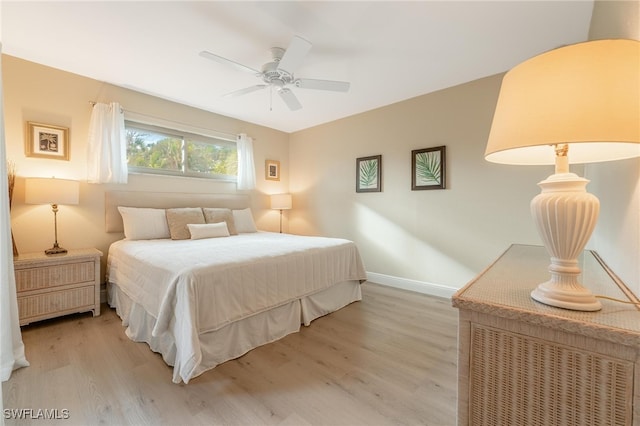 bedroom featuring ceiling fan and light wood-type flooring