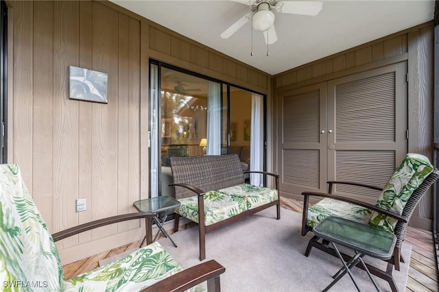 balcony featuring ceiling fan