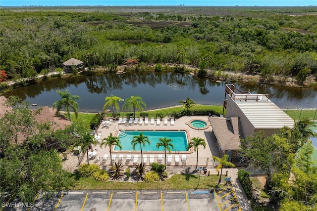 birds eye view of property featuring a water view