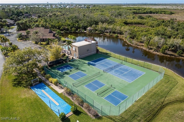 bird's eye view with a water view