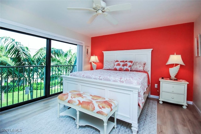 bedroom featuring access to exterior, ceiling fan, and light wood-type flooring