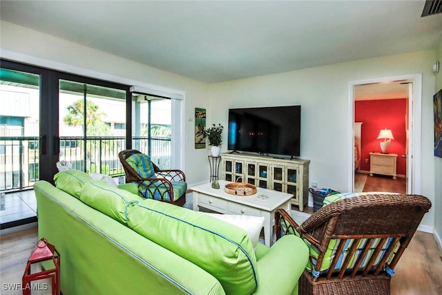 living room with wood-type flooring