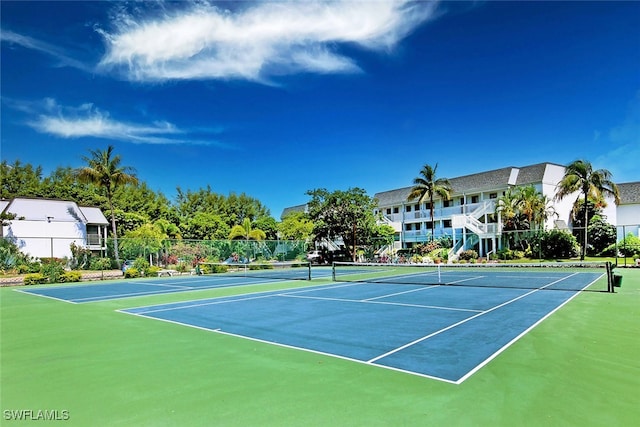 view of tennis court with basketball court