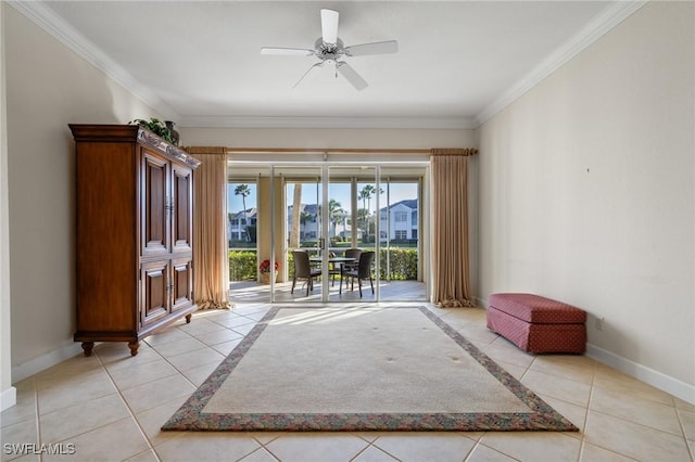 interior space with ceiling fan, light tile patterned floors, and ornamental molding