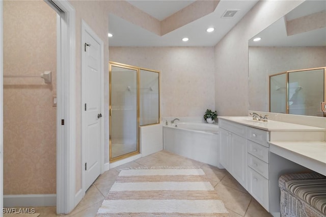 bathroom with tile patterned floors, vanity, and separate shower and tub