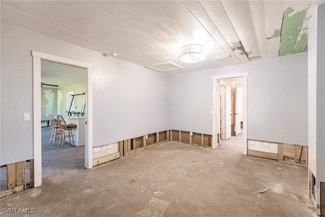 spare room featuring concrete floors