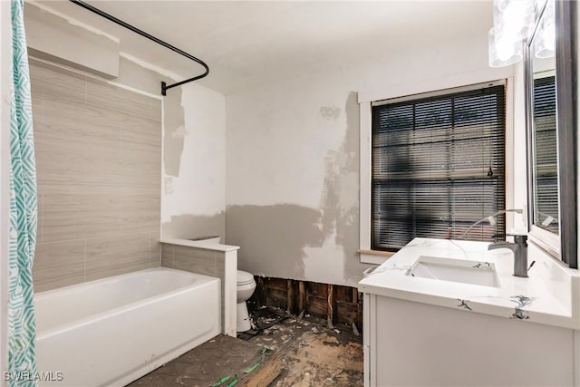 full bathroom featuring vanity, toilet, and shower / tub combo