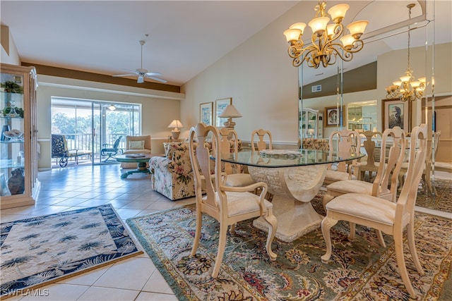 dining room featuring ceiling fan with notable chandelier, high vaulted ceiling, and light tile patterned floors