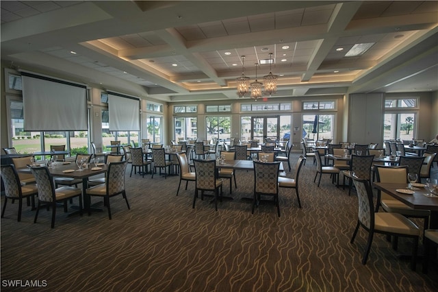 dining area with beam ceiling, coffered ceiling, and dark colored carpet