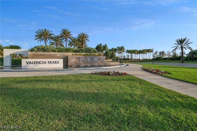 community sign with a lawn