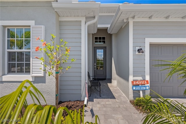 entrance to property featuring a garage