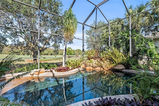 view of pool with a lanai