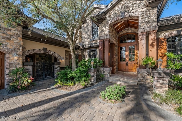 property entrance featuring french doors