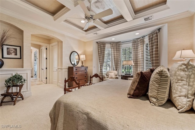 carpeted bedroom featuring beam ceiling, crown molding, ceiling fan, and coffered ceiling