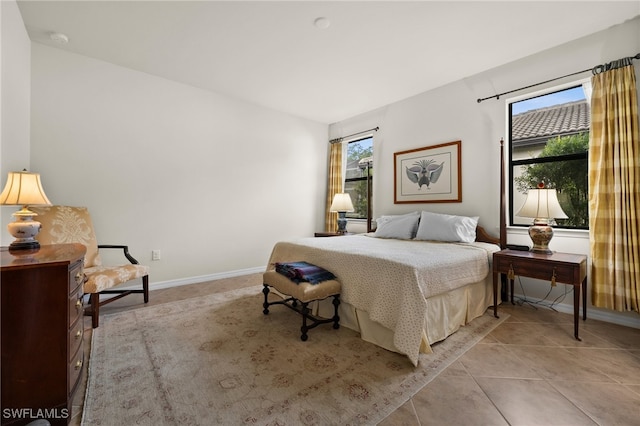 bedroom featuring light tile patterned floors