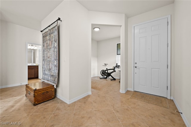 hallway featuring light tile patterned flooring