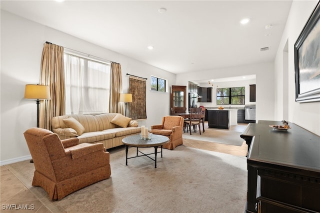 living room with light tile patterned floors