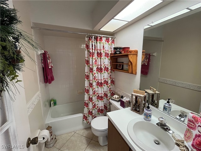 full bathroom with toilet, vanity, tile patterned floors, and shower / bath combo with shower curtain