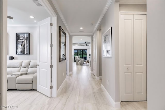 corridor with crown molding