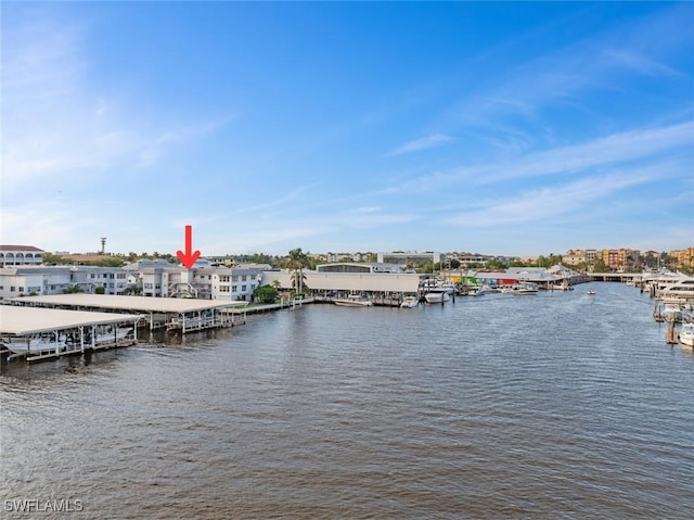 1100 8th Ave S Unit 230K, Naples, FL 34102 - dock area featuring a water view