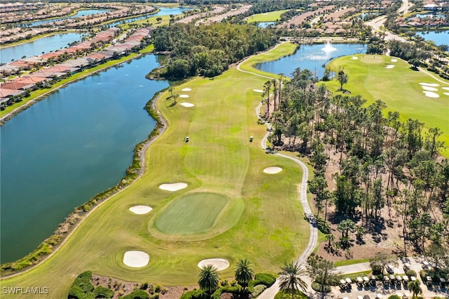 bird's eye view with golf course view and a water view